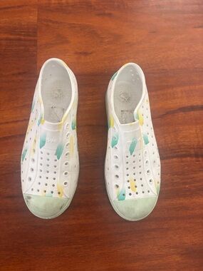 Native Shoes Kids Slip-On Sneakers in White with Green and Yellow Accents